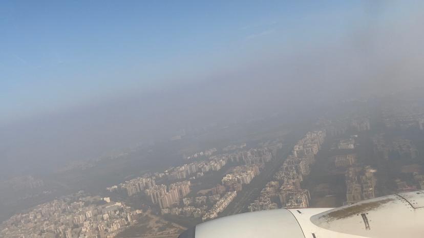 Bird eye view of New Delhi air pollution from airplane 